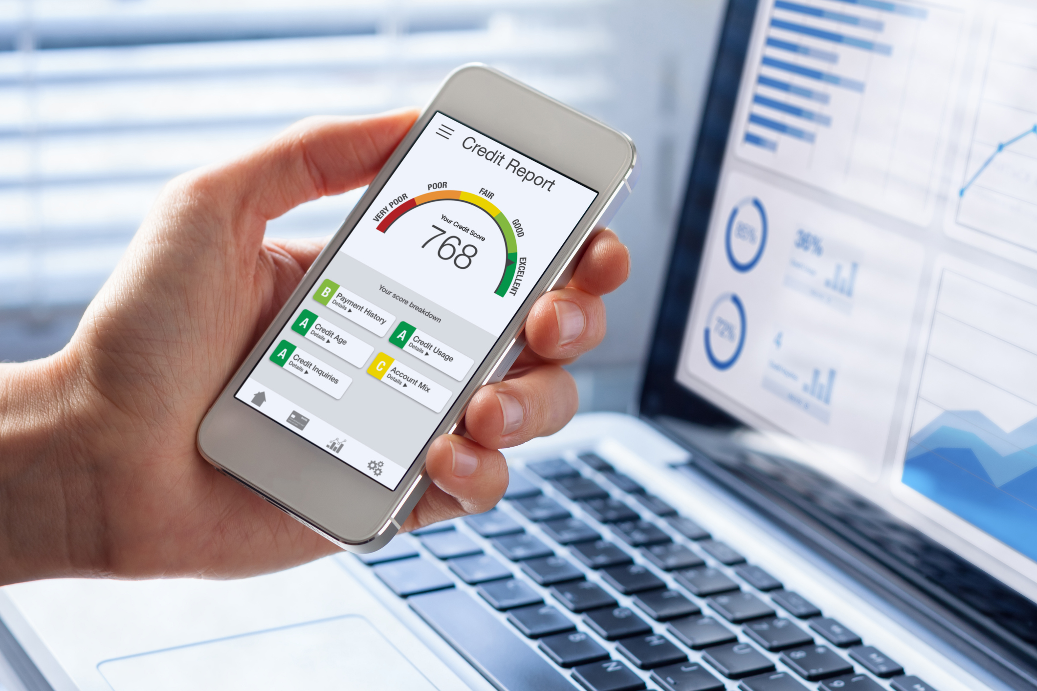 Credit Report with Score rating app on smartphone screen showing creditworthiness of a person for loan and mortgage application based on payment history and debt usage, budget management performance Credit Report with Score rating app on smartphone screen showing creditworthiness of a person for loan and mortgage application based on payment history and debt usage, budget management performance